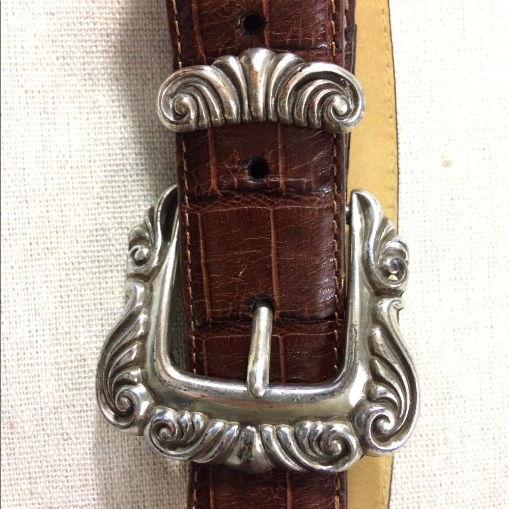 Brighton belt black and brown with silver accents.